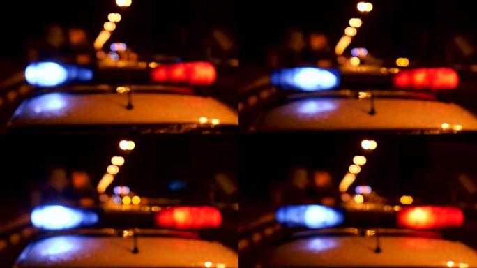 犯罪现场的警车和闪烁的红色和蓝色灯光