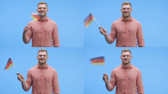 挥舞德国国旗的年轻人