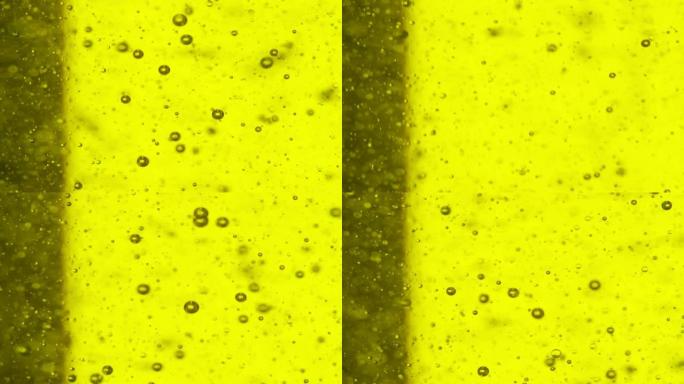 黄色液体中的气泡
