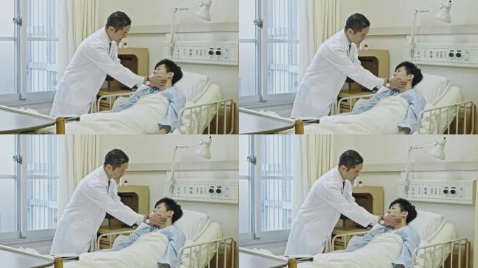 日本男医生在医院病房检查男病人