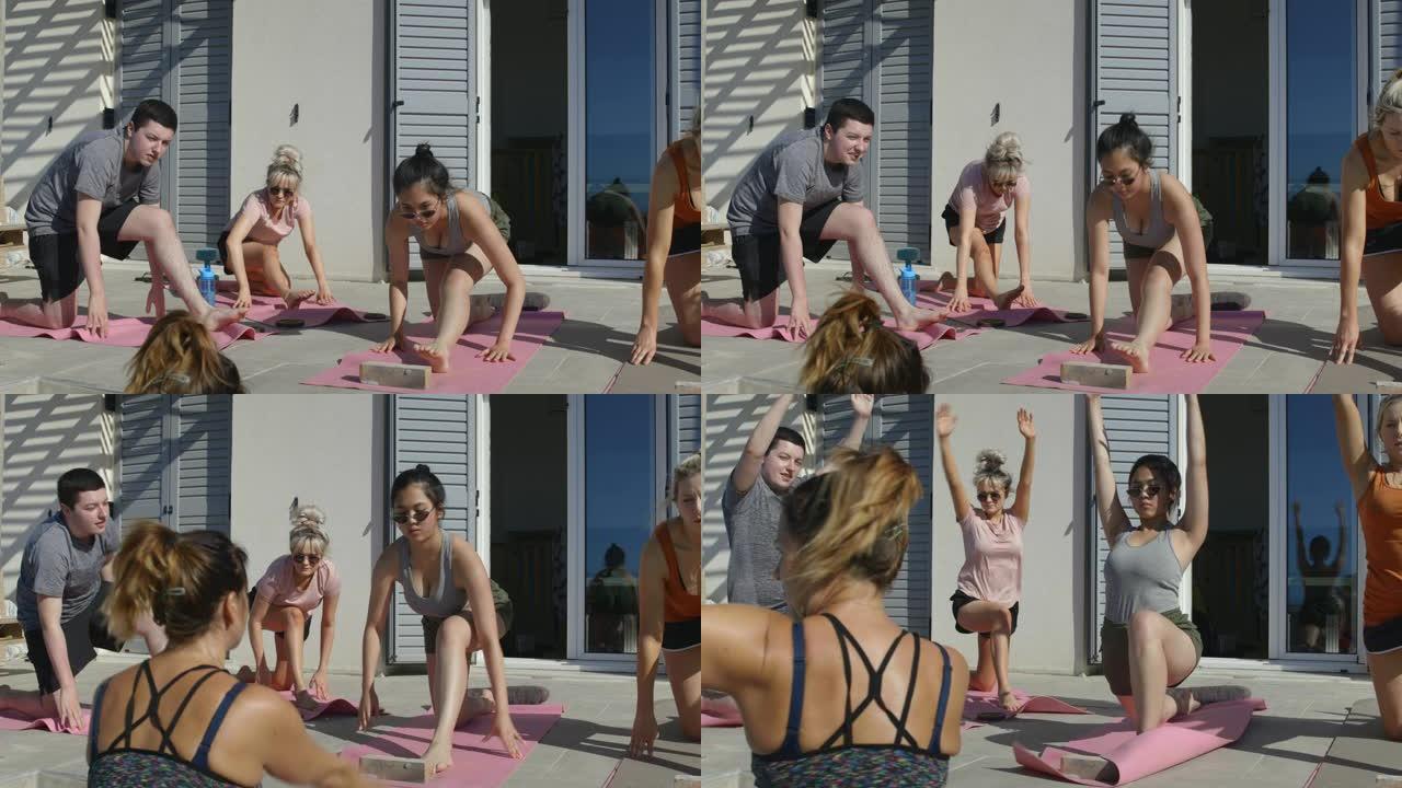 一起做瑜伽的朋友女性瑜伽垫锻炼