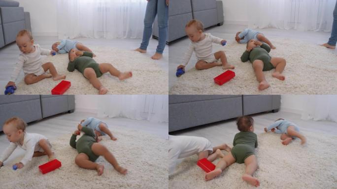 婴儿三胞胎在家里蓬松的地毯上放松