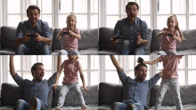 有趣兴奋的爸爸和孩子女儿玩电子游戏庆祝胜利