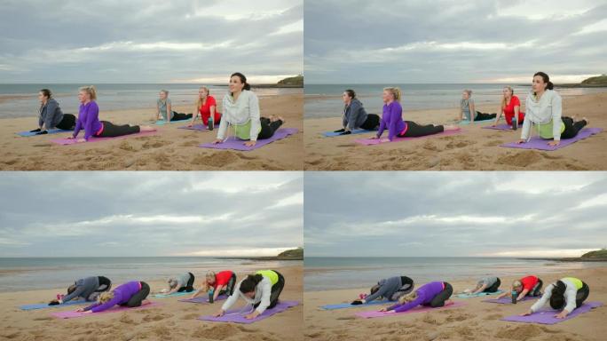 海滩上的女性瑜伽课