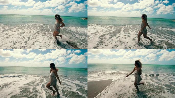 快乐的女士在退潮时沿着海岸奔跑