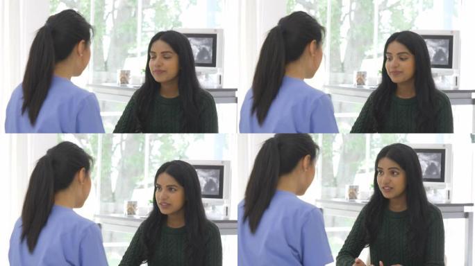 年轻的印度妇女咨询她的医生