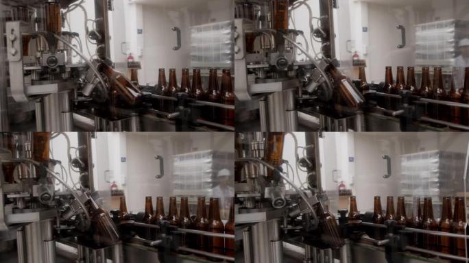在装瓶啤酒的过程中，在自动化机器上生产瓶子