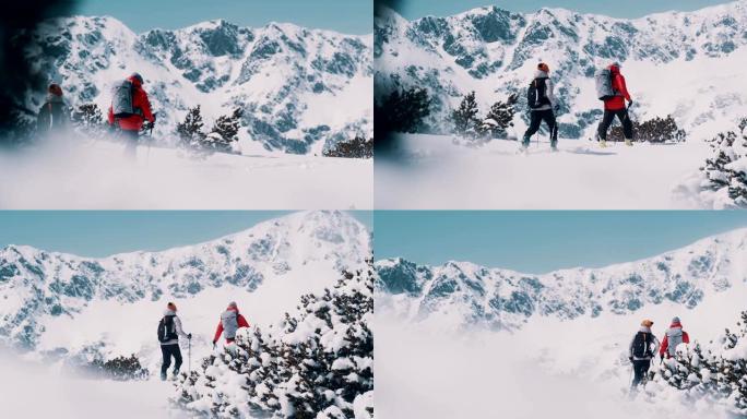 冬季山地探险。小路上的年轻夫妇