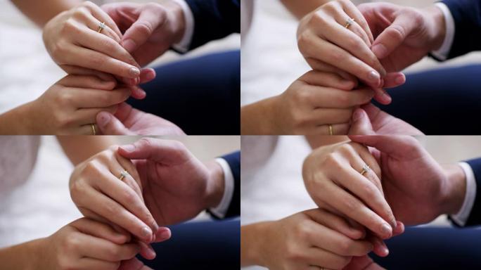 拥有并永远拥有手指结婚戒指仪式新郎新娘优