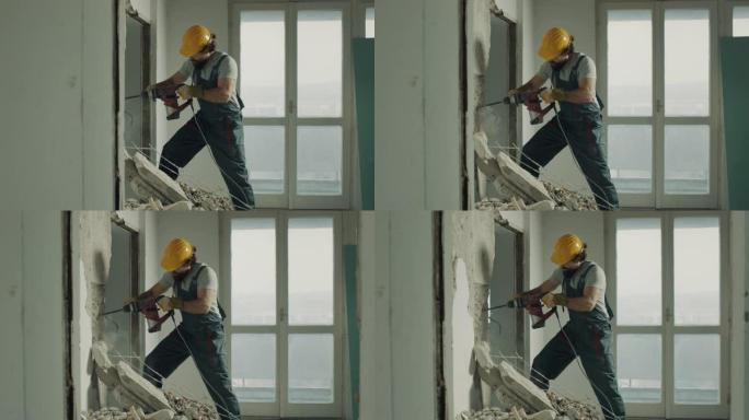 建筑工人用电钻拆墙