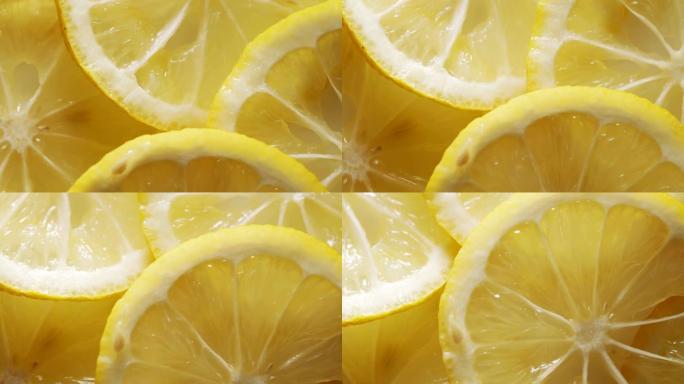 柠檬片旋转。维生素柠檬汁果汁