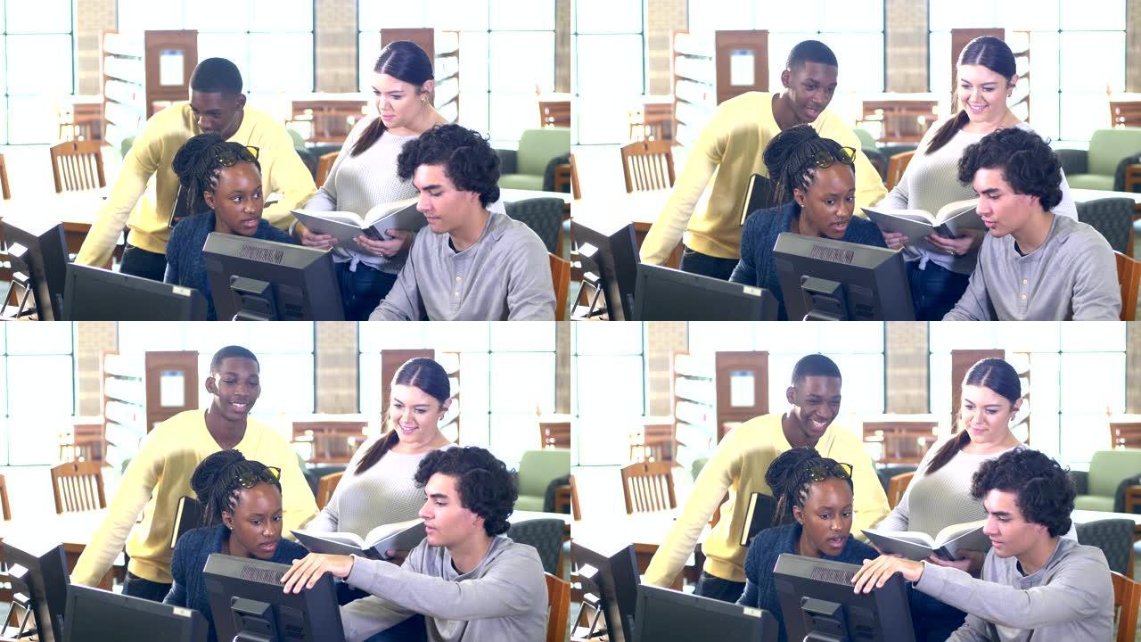 高中生在图书馆计算机上共同工作