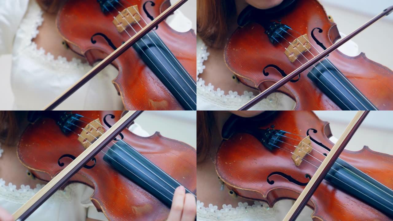 女音乐家在博物馆表演时使用小提琴。