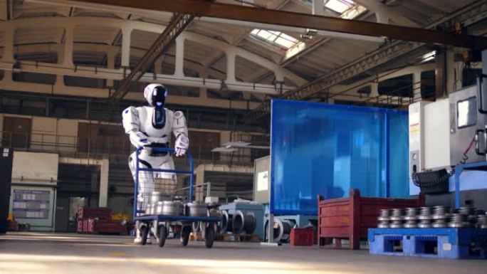 巨大的机器人正在运送一辆手推车穿过工厂