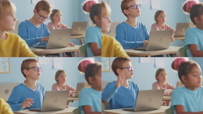 小学计算机科学课: 聪明的男孩使用笔记本电脑，他的同学使用笔记本电脑，每个人都专心听老师的话。儿童接