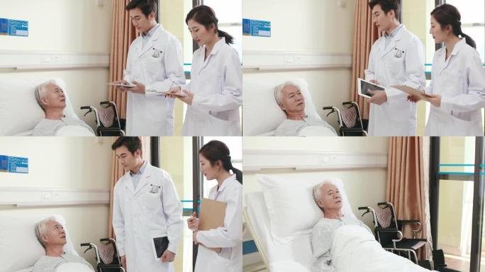 年轻的亚洲医生交谈和安慰高级患者