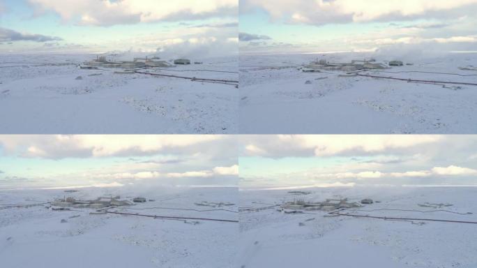 WS在冰岛积雪覆盖的景观中的偏远工厂视图