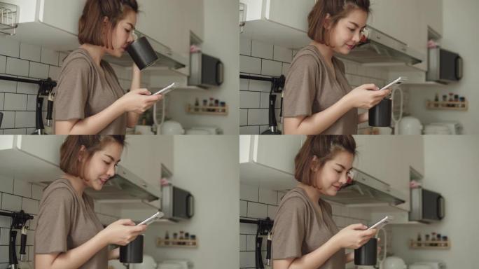年轻女子坐在舒适的厨房里，用手机工作。