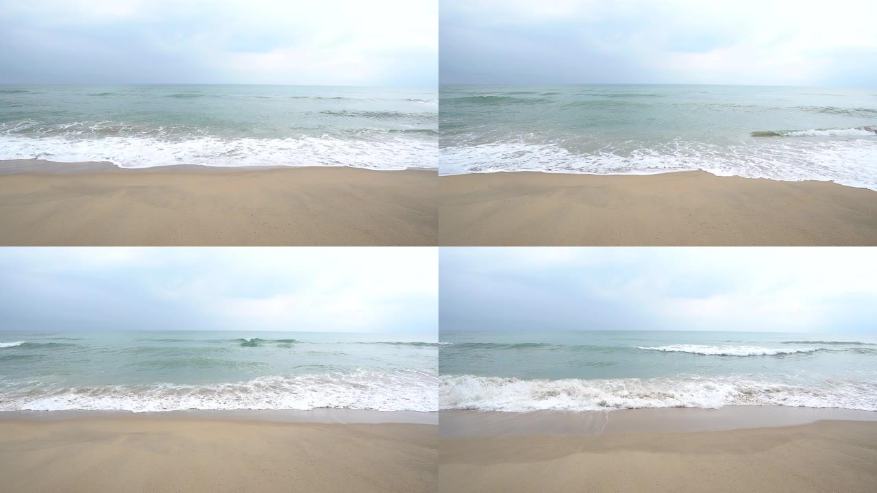 泰国的热带海景海滩，海浪在沙滩上坠落