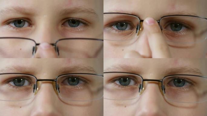 男孩放回眼镜视力问题近视眼学生视力健康