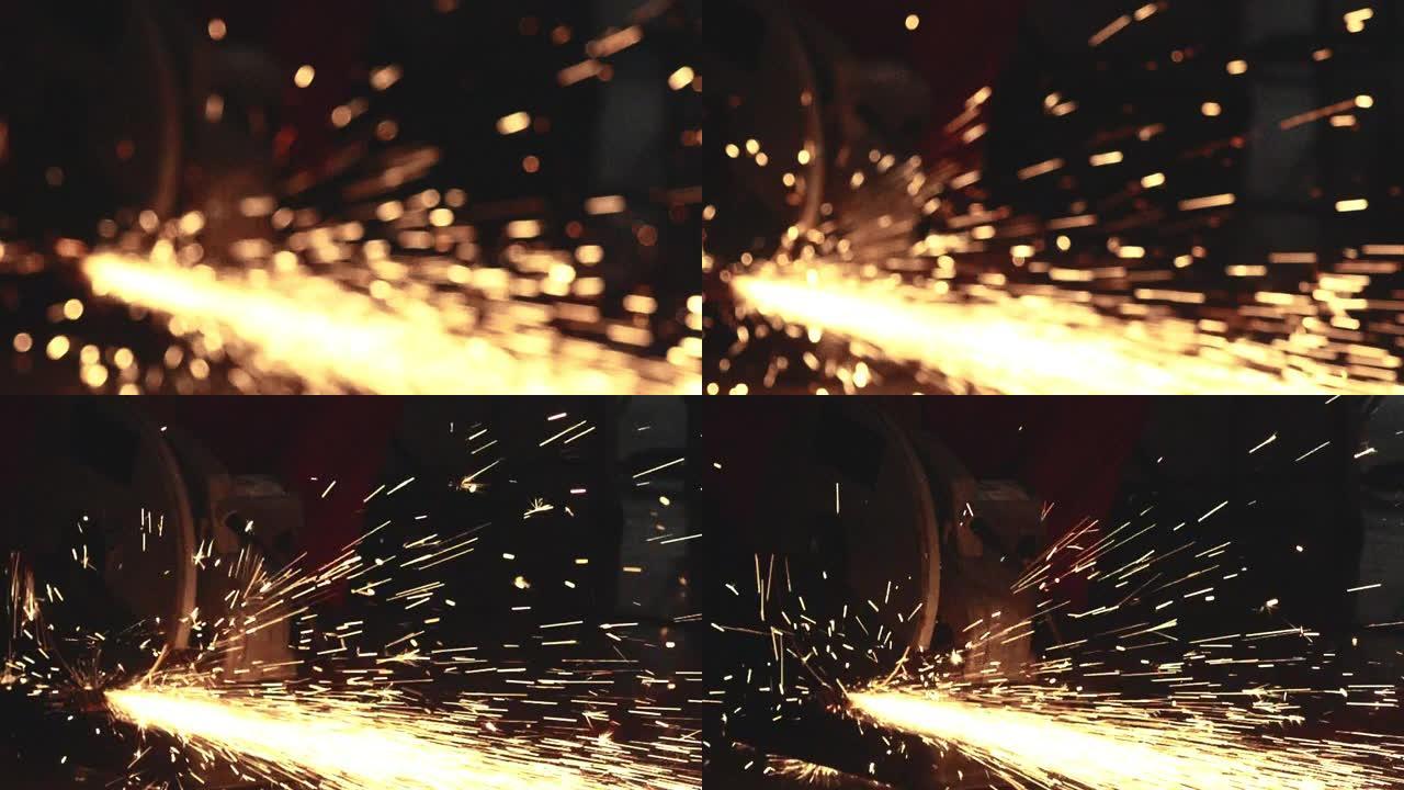 钢铁工人使用研磨机切割钢材