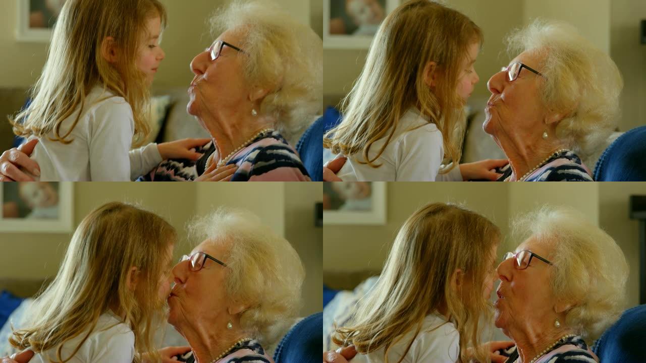 祖母和孙女在客厅互相亲吻4k