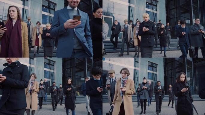 办公室经理和商人正走在现代化的玻璃办公楼前，使用他们的智能手机。人们穿着得体，看起来很成功。他们被他