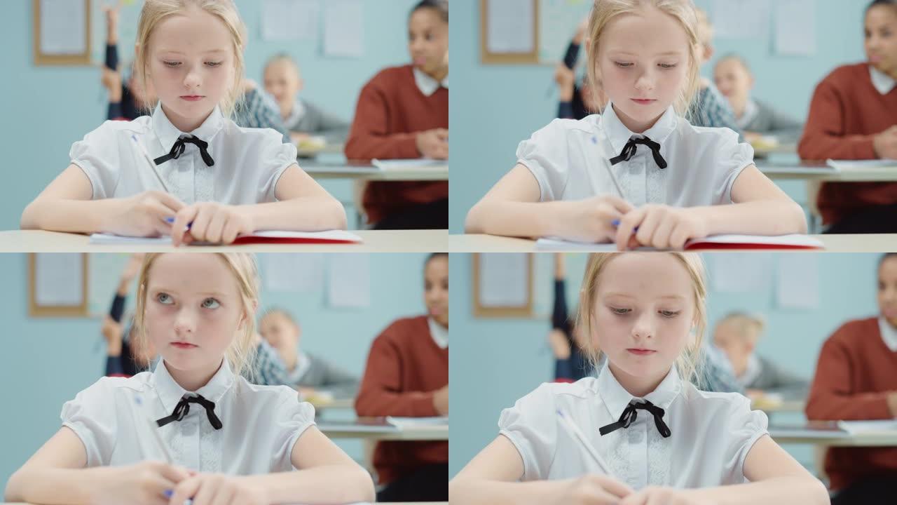 在小学课堂上: 一个聪明可爱的高加索女孩的肖像写在练习笔记本上。初中教室里有不同的孩子，他们勤奋工作