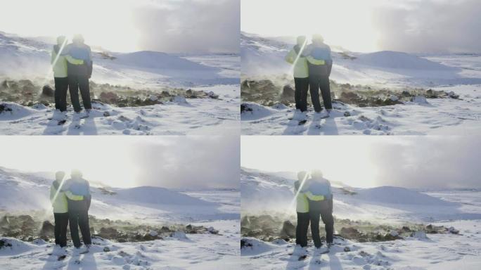 MS夫妇站在冰岛雪山温泉