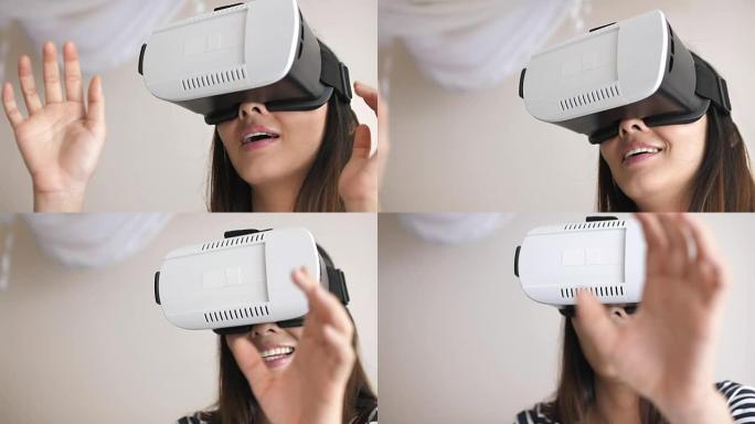 女人戴着VR耳机玩虚拟现实中的视频游戏