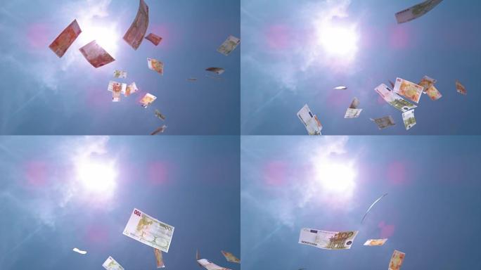 慢动作特写: 许多欧元纸币从阳光明媚的天空中坠落。致富