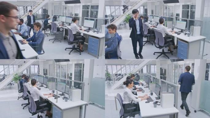 在现代办公室中: 由经理和专家组成的多元化团队在计算机上工作，与同事和电话进行讨论。年轻而积极进取的
