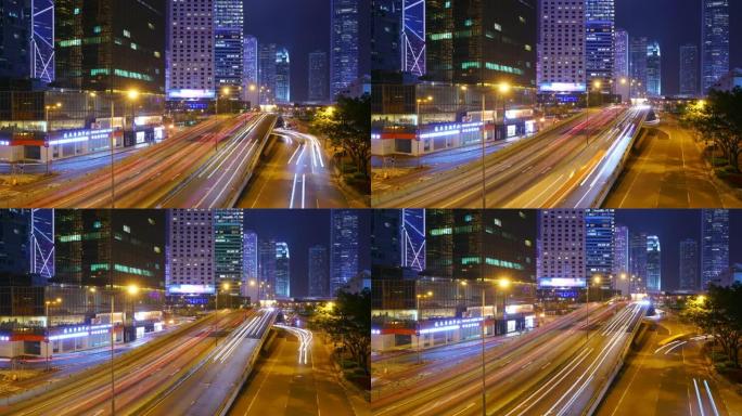 (向下倾斜) 交通延时和香港摩天大楼景观在夜间。