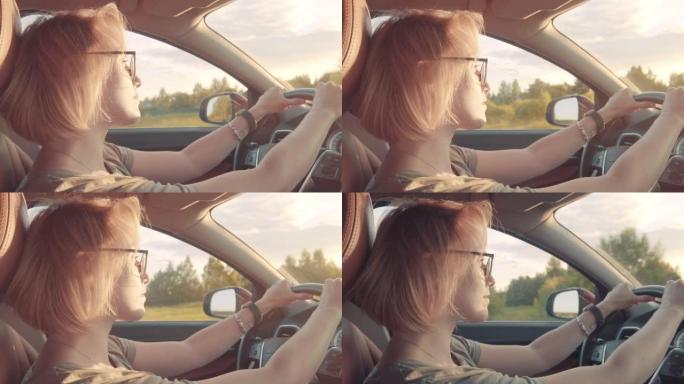 女人在日落时开车