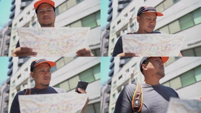 亚洲旅行者从纸张和智能手机上看地图