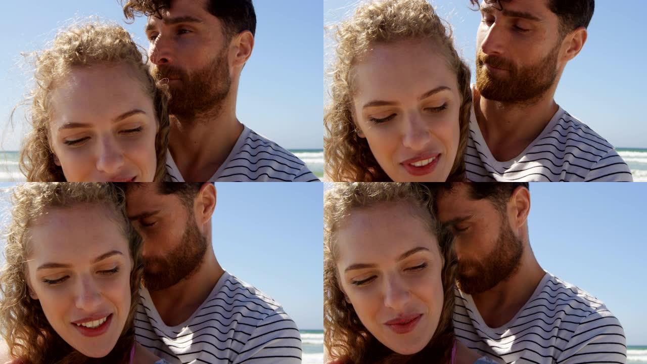 浪漫情侣在4k海滩互相拥抱