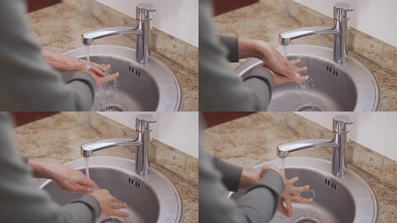 冠状病毒大流行期间在检疫中自我隔离的女人洗手