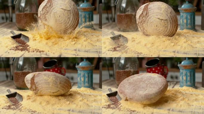 慢动作: 掉落的面包在厨房的桌子上散布玉米面。