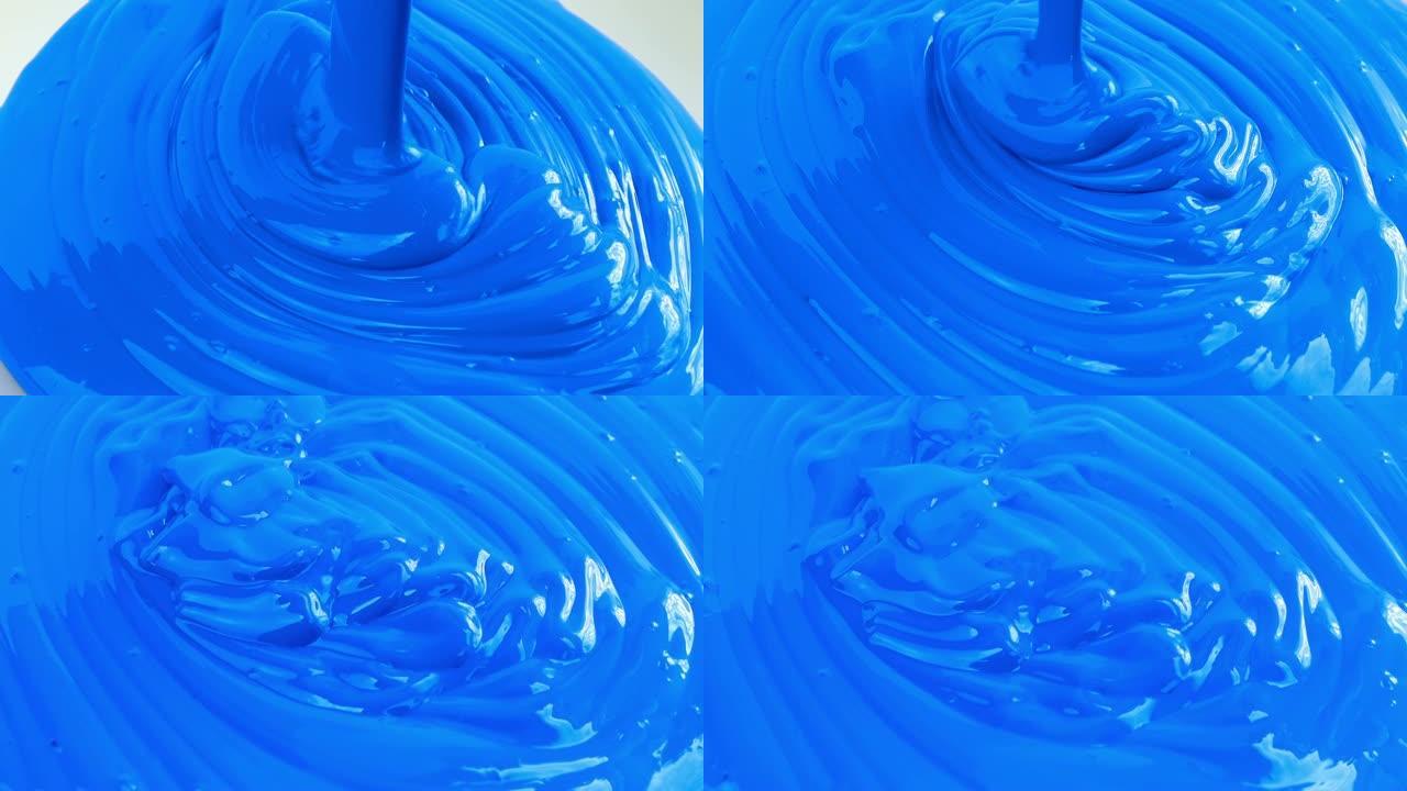 蓝色油漆浇注颜料涂料倒出