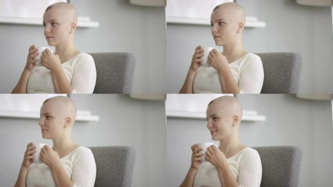 年轻的成年女性癌症患者在医院喝杯酒