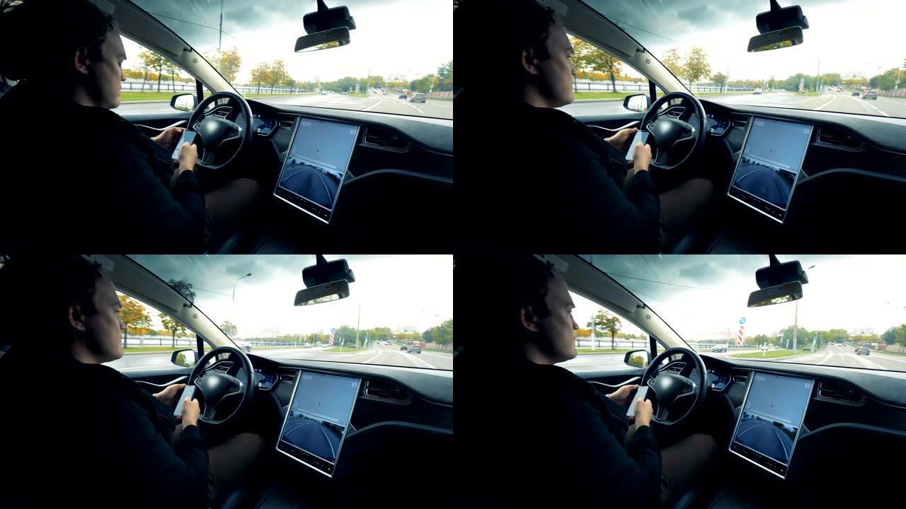 男司机用电话工作，坐在自动驾驶仪上的汽车上，特写镜头。