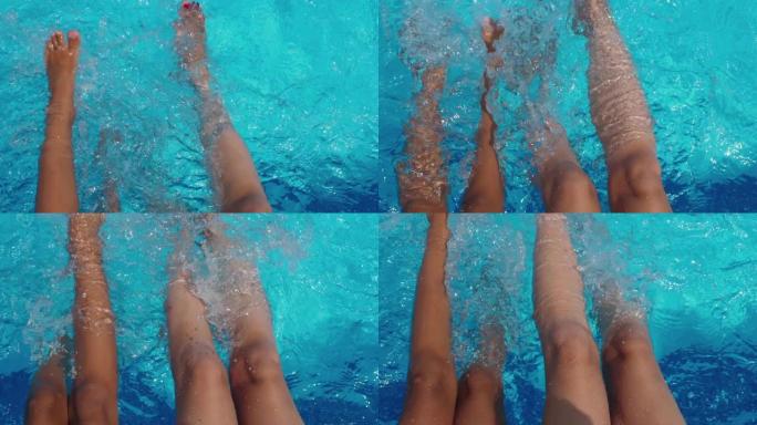 水中女孩的腿。慢动作。