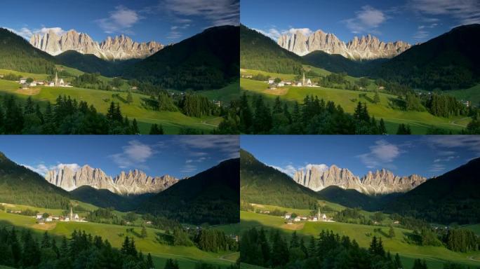 意大利圣马达莱纳村的平移镜头。多洛米蒂山脉背景。