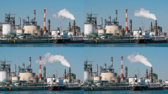 蒸汽烟雾，工厂和工业污染概念在河旁的炼油工业区的4k时间流逝