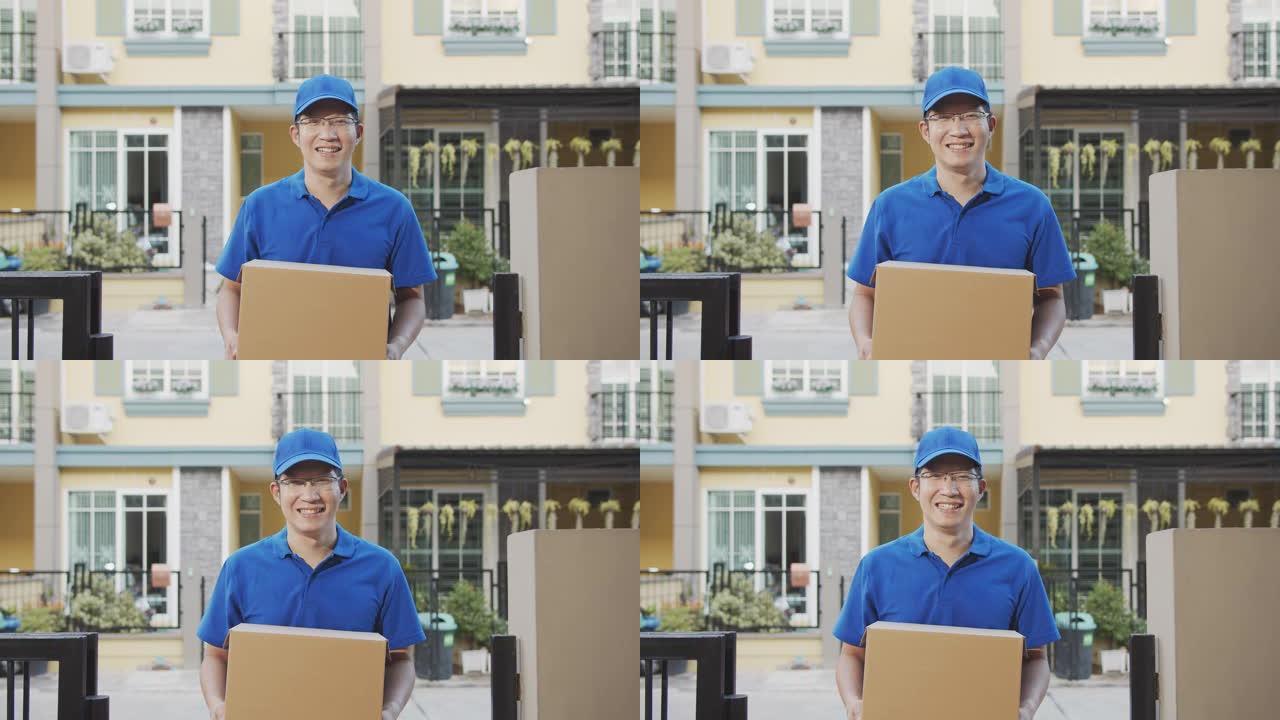 4K UHD: 送货员拿着集装箱箱子站在家里。