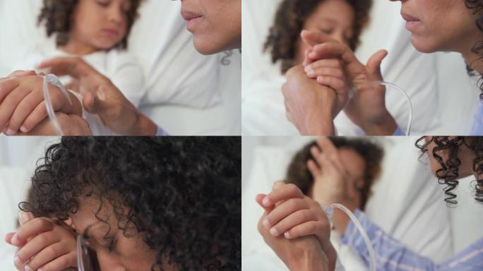在4k医院的病房里，非洲裔美国母亲牵着儿子的手的特写镜头
