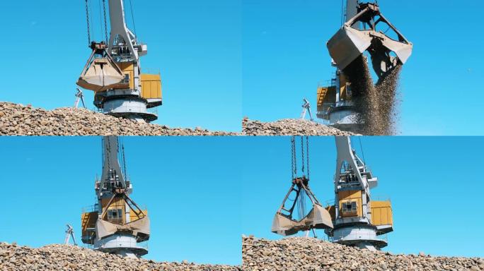 黄鹤用金属桶搬运瓦砾。工业采矿概念。