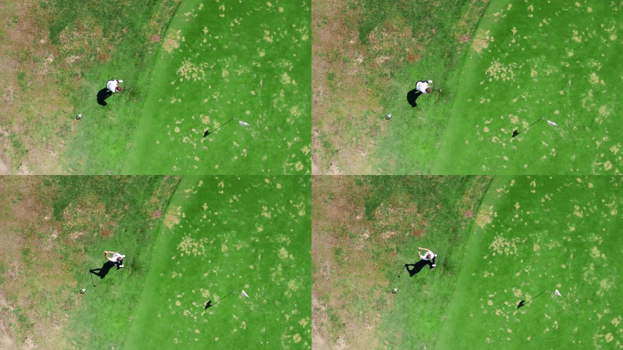 高尔夫球手在绿色球场打球。