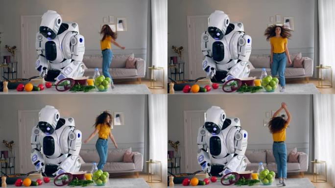 这位女士在机器人做饭时跳来跳去