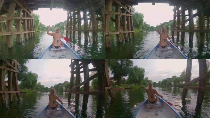 WS女人在河上划独木舟